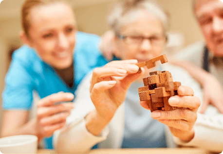 Old Woman Playing With Blocks